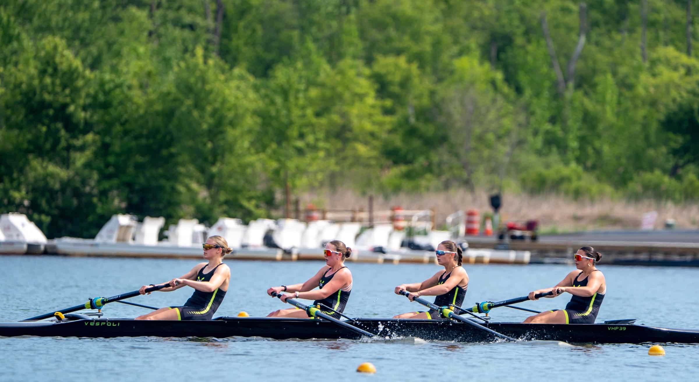 A CBC quad racing on a buoyed course, blades together